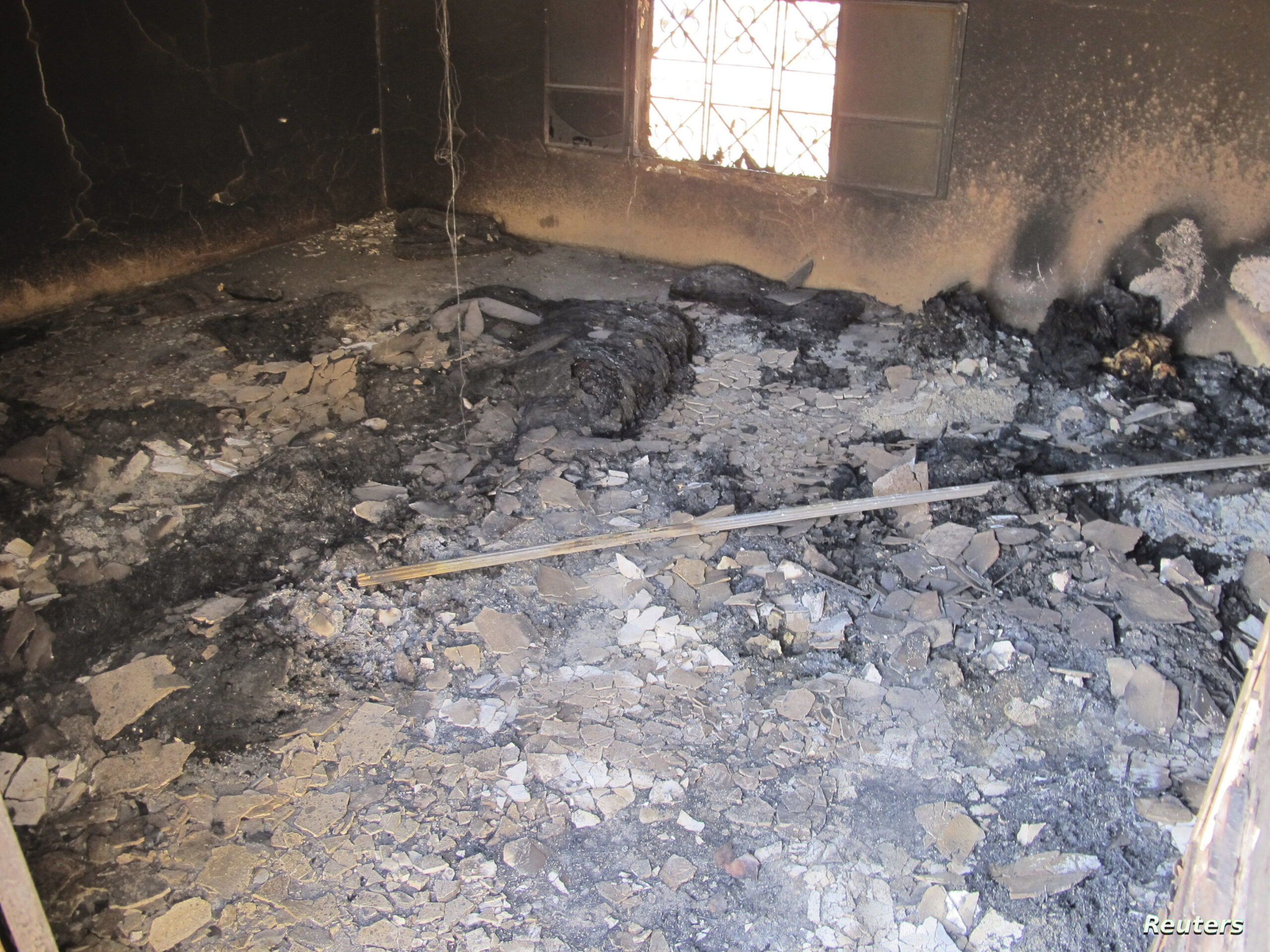 A view of the interior of a house in the Syrian hamlet of Mazraat al-Qubeir June 8, 2012, where opposition activists say at least 78 people were massacred on Wednesday. U.N. observers who on Friday visited the site of a reported massacre in the Syrian village saw indications that government forces had been there and traces of slaughter in some of the houses, the United Nations said. REUTERS/David Manyua/United Nations/Handout (SYRIA - Tags: CIVIL UNREST POLITICS) FOR EDITORIAL USE ONLY. NOT FOR SALE FOR MARKETING OR ADVERTISING CAMPAIGNS. THIS IMAGE HAS BEEN SUPPLIED BY A THIRD PARTY. IT IS DISTRIBUTED, EXACTLY AS RECEIVED BY REUTERS, AS A SERVICE TO CLIENTS